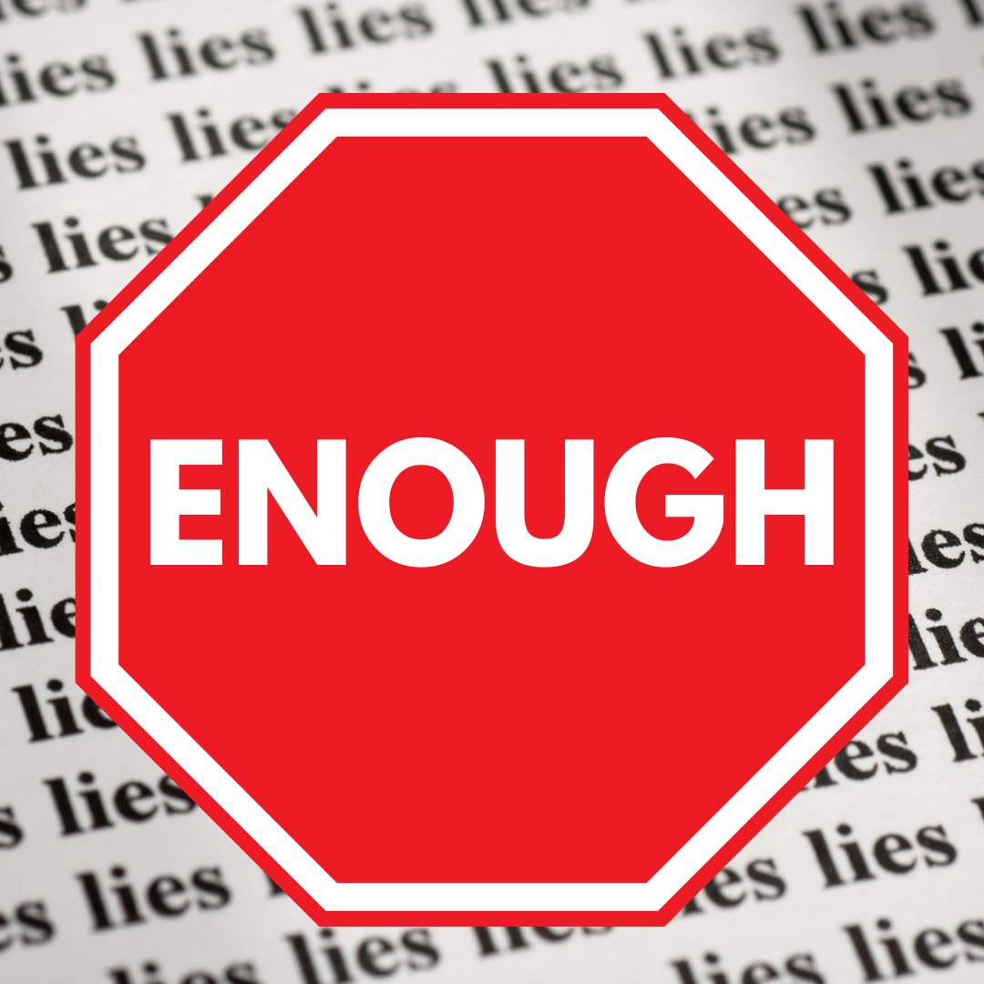 STOP SIGN THAT SAYS ENOUGH ON BACKGROUND OF PAPER WITH THE WORD 